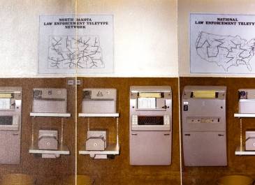 Wall of Teletype machines (date unknown)